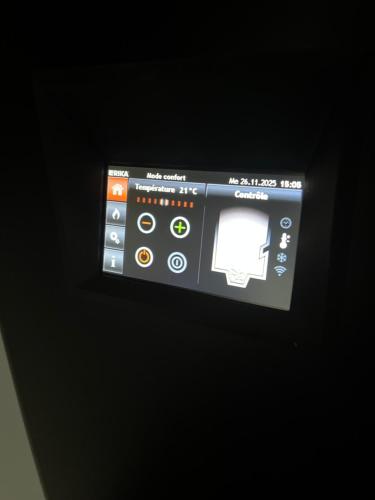 a close up of a control panel of a vehicle at Maison chic & moderne à la campagne 