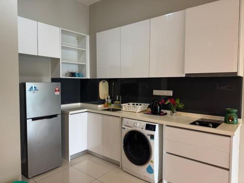 Kuchyň nebo kuchyňský kout v ubytování Elysia Park Legoland Iskandar