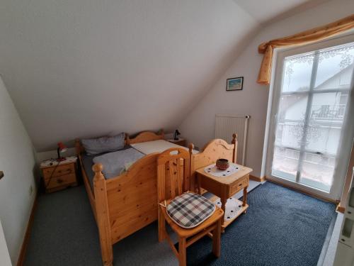 Giường trong phòng chung tại Ferienhaus zur Alleenstraße