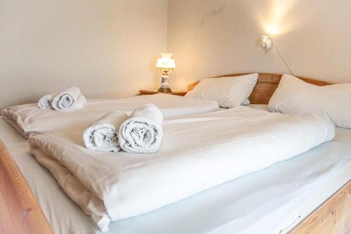 Ένα ή περισσότερα κρεβάτια σε δωμάτιο στο Haus Horizont I HZ06