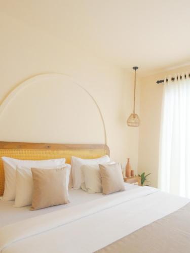 Giường trong phòng chung tại Samudrá Ahangama