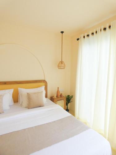 Giường trong phòng chung tại Samudrá Ahangama