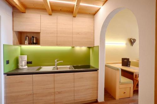 Kuchyň nebo kuchyňský kout v ubytování Mountain Living Apartments