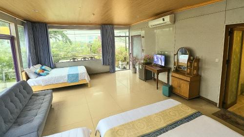 Ένα ή περισσότερα κρεβάτια σε δωμάτιο στο Sala Ho Tram