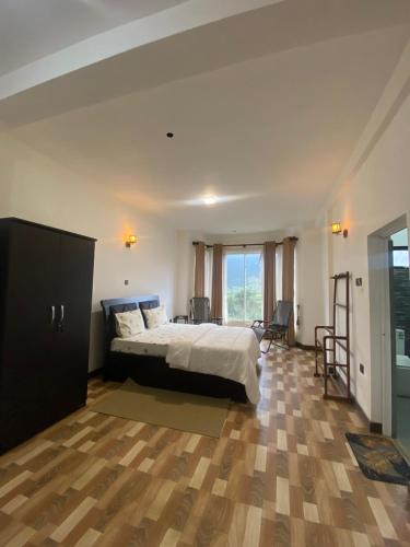 Кровать или кровати в номере Cool Cloud Villa