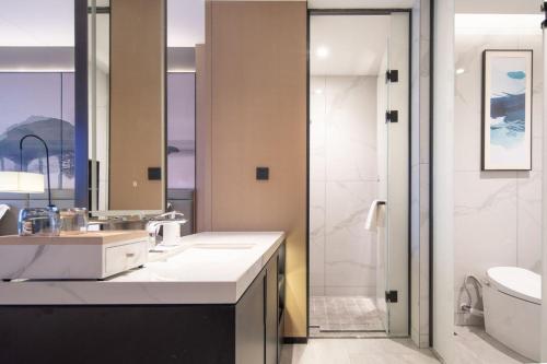 Koupelna v ubytování Jin Yi Youxuan Hotel Jungar Banner Government Branch