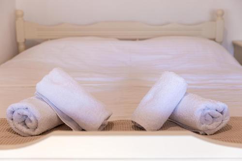 Ένα ή περισσότερα κρεβάτια σε δωμάτιο στο The courtyard house