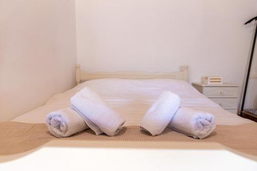 Ένα ή περισσότερα κρεβάτια σε δωμάτιο στο The courtyard house