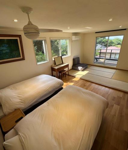 ISANA Panorama Villa 天然温泉付き 大室山付近 海の絶景の一軒家貸別荘