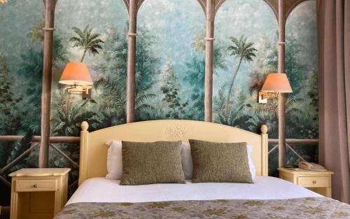 Ένα ή περισσότερα κρεβάτια σε δωμάτιο στο Logis Hotel Diana