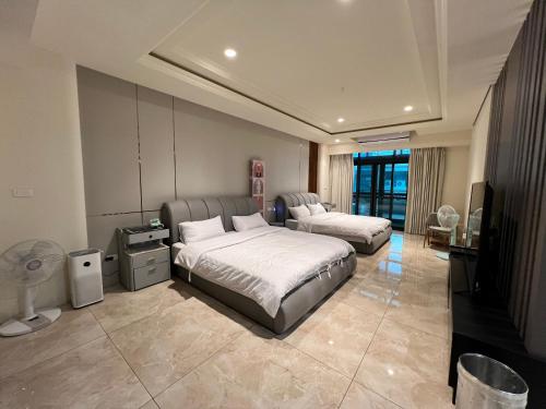 Voodi või voodid majutusasutuse 鹿港春天Spring B&B toas