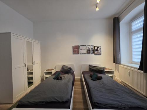 Ένα ή περισσότερα κρεβάτια σε δωμάτιο στο Mikra Homes24 in Zwickau