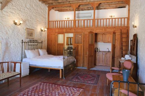 Postel nebo postele na pokoji v ubytování Alamango