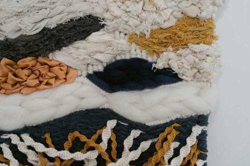 a close up of a blanket with clouds on it at Neptunes Guest House in Port Campbell