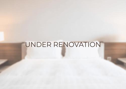 Ένα ή περισσότερα κρεβάτια σε δωμάτιο στο Marins Beach Club - Adults Only Hotel