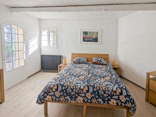 Postel nebo postele na pokoji v ubytování Charmant T3 dans un mas provençal proche Avignon