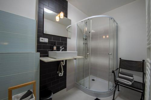 Koupelna v ubytování Apartmány Caffe & Grill