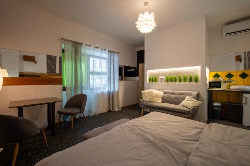 Postel nebo postele na pokoji v ubytování Apartmány Caffe & Grill