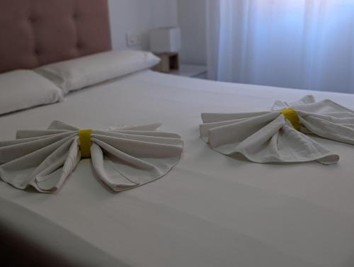 Una cama o camas en una habitación de Livingtarifa Azahar