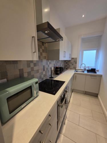 Kuchyň nebo kuchyňský kout v ubytování Station Bridge Collection - Flat 4