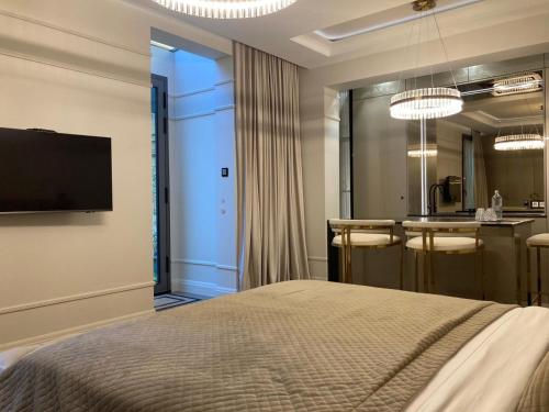 Giường trong phòng chung tại Premiere Monte Carlo