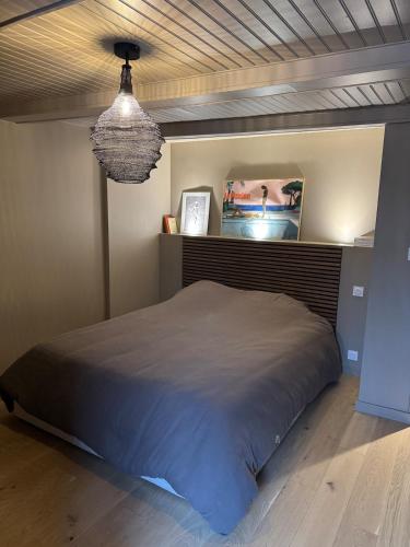 Ένα ή περισσότερα κρεβάτια σε δωμάτιο στο Brume - face au vieux port, hyper-centre