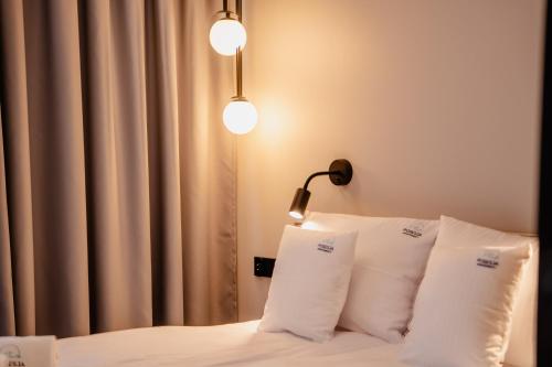 Postel nebo postele na pokoji v ubytování POSESJA APARTAMENTY & SPA - Posesja Plażowa 4b I