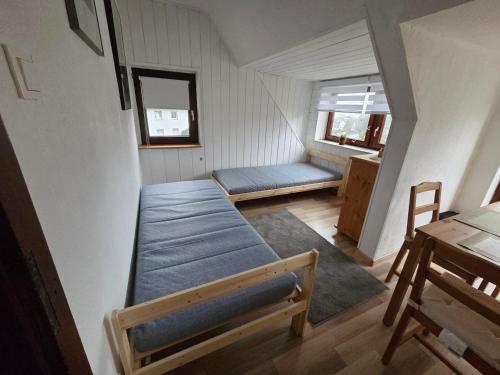 Ένα ή περισσότερα κρεβάτια σε δωμάτιο στο Spacious Apartment in Odenthal near Leverkusen