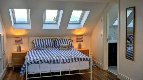 Voodi või voodid majutusasutuse Welcome to the Cobbler's at Barry Island toas