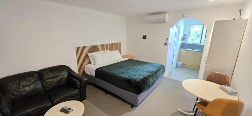 Ένα ή περισσότερα κρεβάτια σε δωμάτιο στο Motel 22