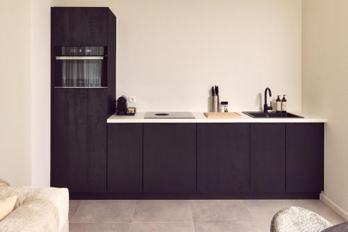 O bucătărie sau chicinetă la Van der Valk Hotel Mechelen