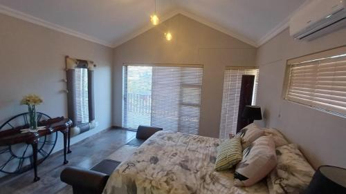 En eller flere senge i et værelse på Windswael 3