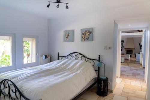 Postel nebo postele na pokoji v ubytování Le grand gîte