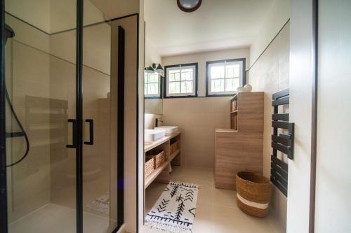 Ванная комната в Appartement pour 6 personnes- Villa LOU BOUSQUET étage