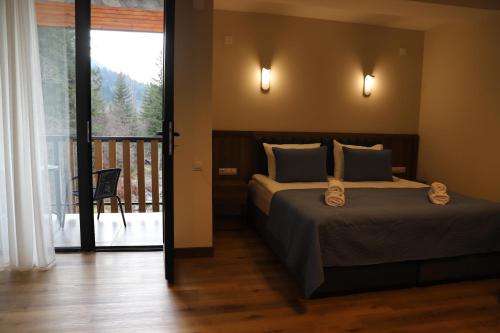 Voodi või voodid majutusasutuse Hotel - Jodi Lare toas