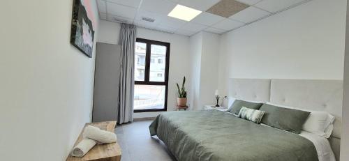 En eller flere senge i et værelse på Hotel Ribesalbes Albergue deportivo