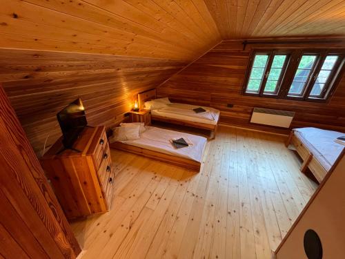 Ένα ή περισσότερα κρεβάτια σε δωμάτιο στο Elsa Chalupa