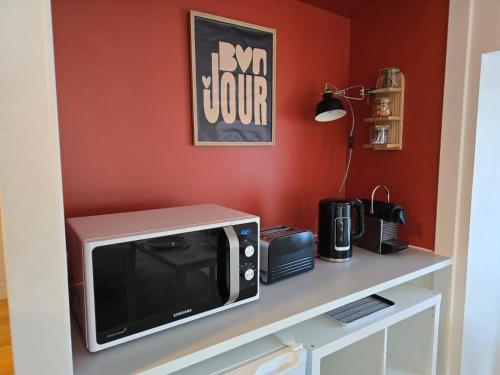 Kuchyň nebo kuchyňský kout v ubytování Le Cocon ô coeur du centre ville