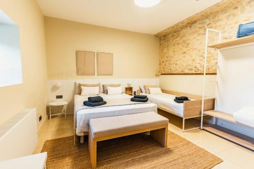 Кровать или кровати в номере Casa Rural En El Balcón Del Delta Del Ebro