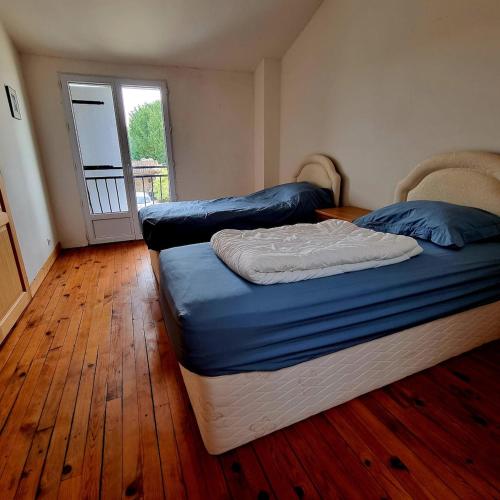 Postel nebo postele na pokoji v ubytování Gîte spacieux