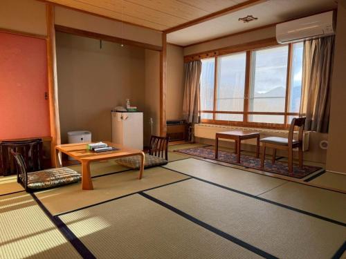 Χώρος καθιστικού στο Nishihoppo Onsen HOTEL