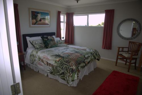 Ένα ή περισσότερα κρεβάτια σε δωμάτιο στο Willowbark Ranch B&B