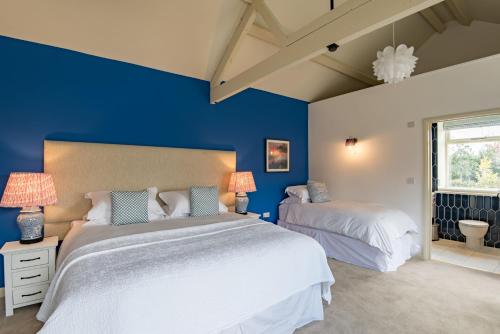 Postel nebo postele na pokoji v ubytování Rose Barn