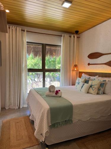 Postel nebo postele na pokoji v ubytování Villa Jucá Casa 03