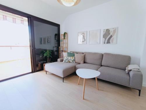 Et opholdsområde på Cozy & Terrace Apartament5