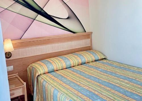 Ένα ή περισσότερα κρεβάτια σε δωμάτιο στο Hotel Derby Exclusive