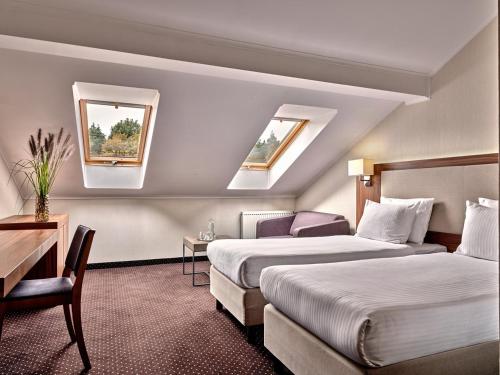 Postel nebo postele na pokoji v ubytování Hotel Villa Verde Congress & Spa