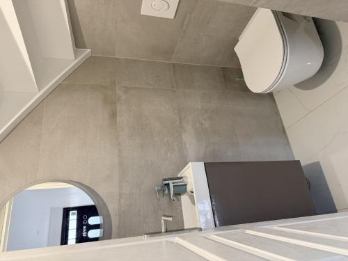 Ένα μπάνιο στο Le sympathique