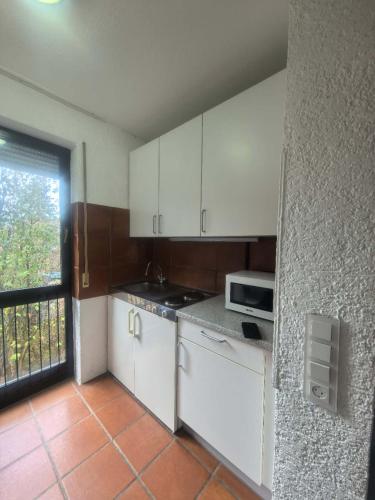 Η κουζίνα ή μικρή κουζίνα στο Schönes Apartment 12-2 Uni-Mainz