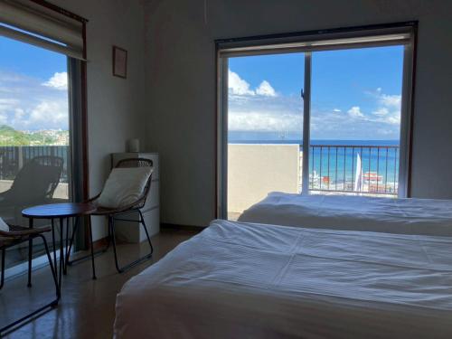 Ένα ή περισσότερα κρεβάτια σε δωμάτιο στο Plus-one from Cg7p